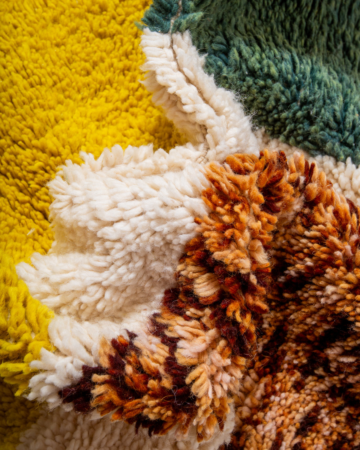 Modern, designer, handcrafted Berber rug from Morocco. Beniourain carpet with beautiful colours and patterns and fluffy wool texture.